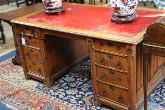 Gillows after a design by A.W.N.Pugin. A Victorian gothic revival oak desk, W. 5ft. D. 2ft 6in. H.2ft 6in.